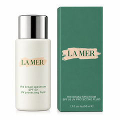 La Mer broad spectrum SPF 50 UV protecting fluid bottle and packaging on a white background